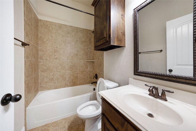 bathroom featuring vanity, toilet, and shower / bathtub combination
