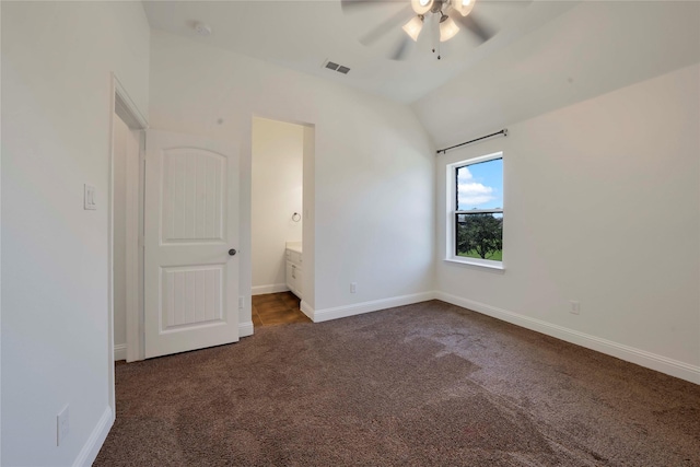 6917 Moody Ave, Frisco, TX 75035 - unfurnished bedroom with dark carpet, lofted ceiling, ensuite bathroom, and ceiling fan