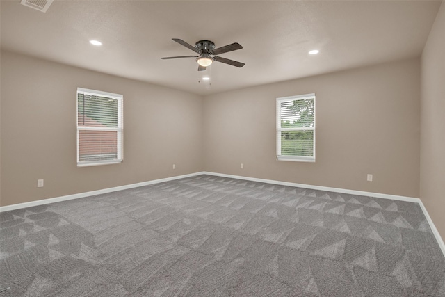703 S Montgomery St, Sherman, TX 75090 - carpeted empty room with a ceiling fan, baseboards, and recessed lighting