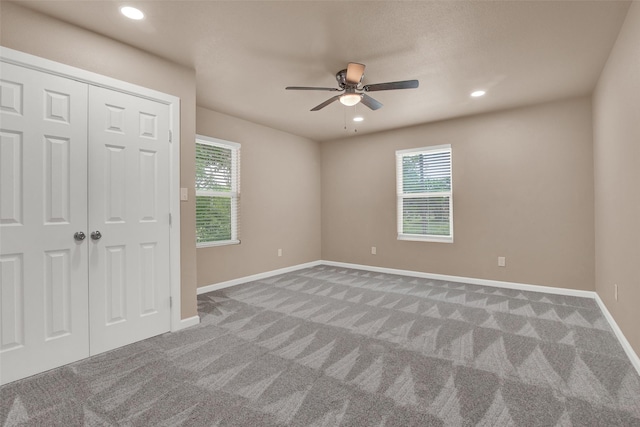 703 S Montgomery St, Sherman, TX 75090 - unfurnished bedroom with carpet flooring, recessed lighting, baseboards, ceiling fan, and a closet