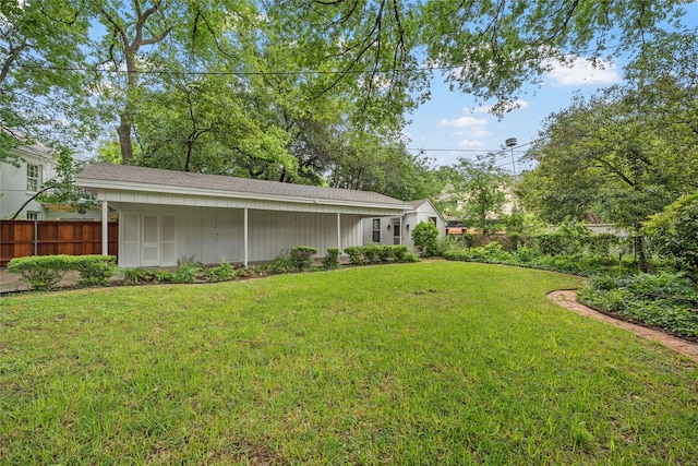 view of yard with fence
