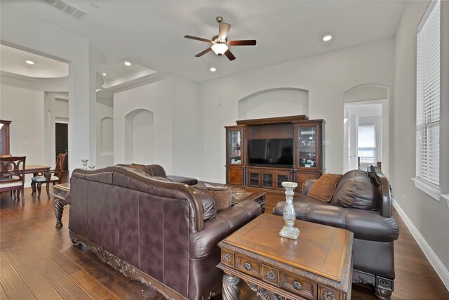 living area featuring recessed lighting, a ceiling fan, dark wood-style floors, and visible vents