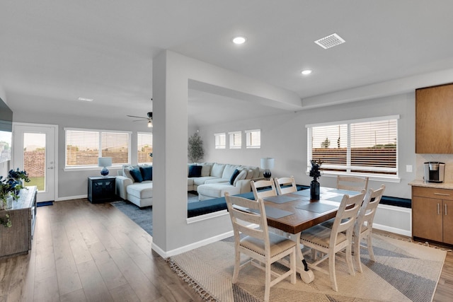 dining space with ceiling fan, light wood-style floors, recessed lighting, baseboards, and visible vents