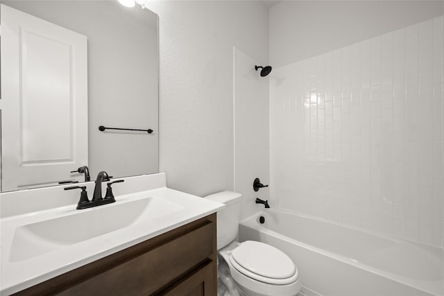 bathroom featuring vanity, shower / bathtub combination, and toilet