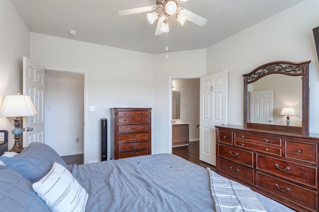 735 Cedar Cove Dr, Princeton, TX 75407 - bedroom with baseboards, dark wood-style flooring, and ceiling fan