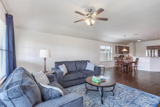 735 Cedar Cove Dr, Princeton, TX 75407 - living area featuring dark wood-style flooring, a ceiling fan, and baseboards