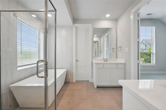 1000 Tulip Pl, Crowley, TX 76036 - full bathroom with tile patterned floors, vanity, a soaking tub, recessed lighting, and a shower stall