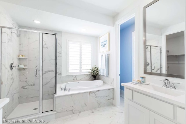 full bathroom featuring vanity, marble finish floor, a bath, and a marble finish shower