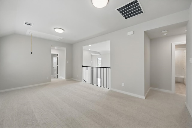 1000 Tulip Pl, Crowley, TX 76036 - spare room with attic access, light carpet, and baseboards