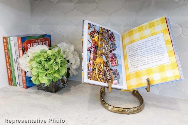room details featuring wallpapered walls