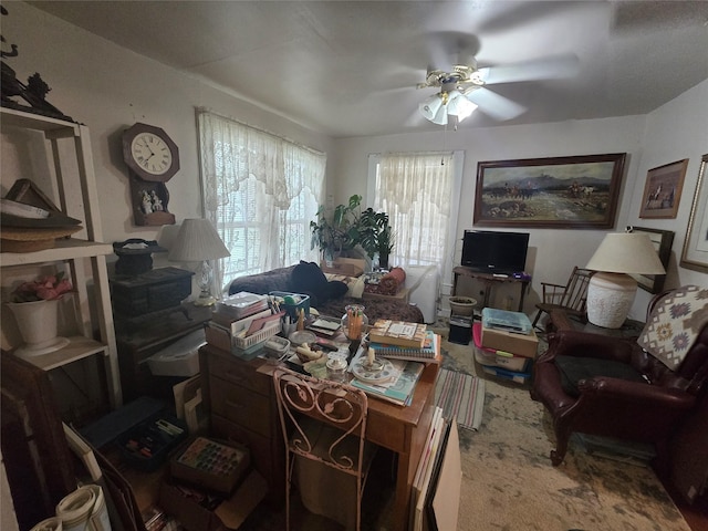 interior space with a ceiling fan