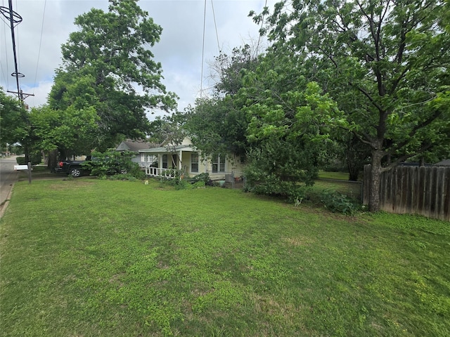 view of yard featuring fence