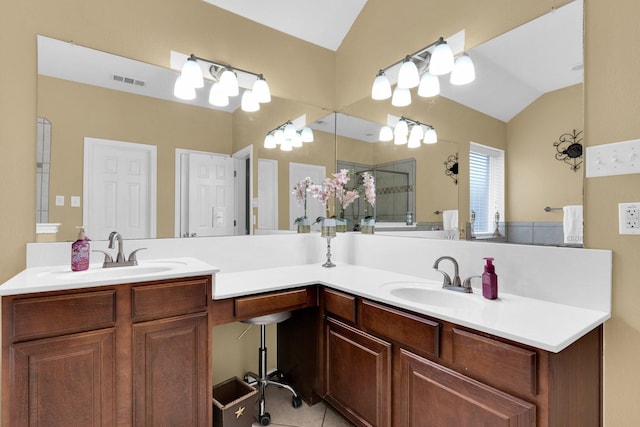 full bathroom with a sink, visible vents, double vanity, and lofted ceiling