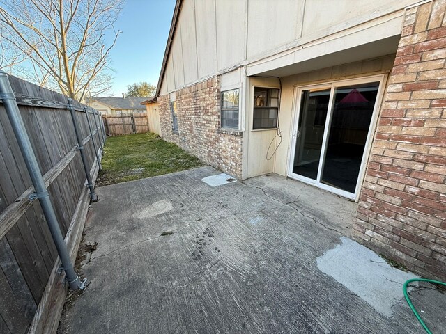 view of yard with a fenced backyard and a patio area
