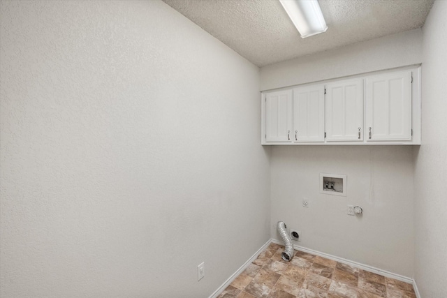 laundry room featuring hookup for an electric dryer, hookup for a gas dryer, cabinet space, baseboards, and hookup for a washing machine