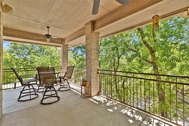 view of patio / terrace with a ceiling fan and outdoor dining area
