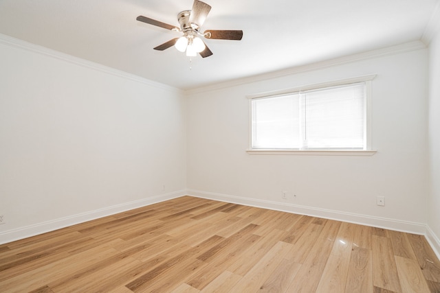 unfurnished room with a ceiling fan, baseboards, ornamental molding, and light wood finished floors