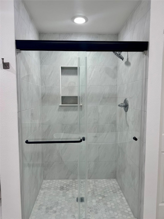 bathroom with a stall shower