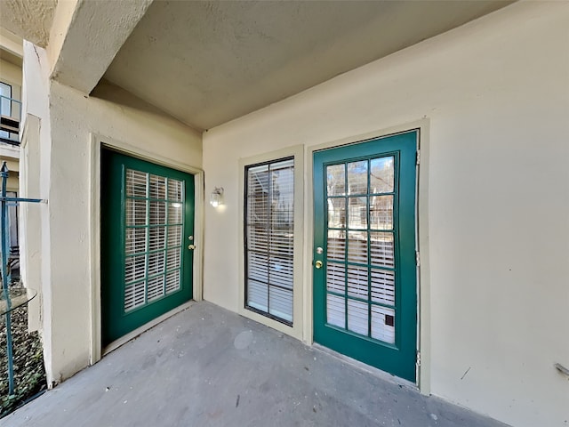 3105 San Jacinto St Unit 108, Dallas, TX 75204 - property entrance featuring a patio area and stucco siding