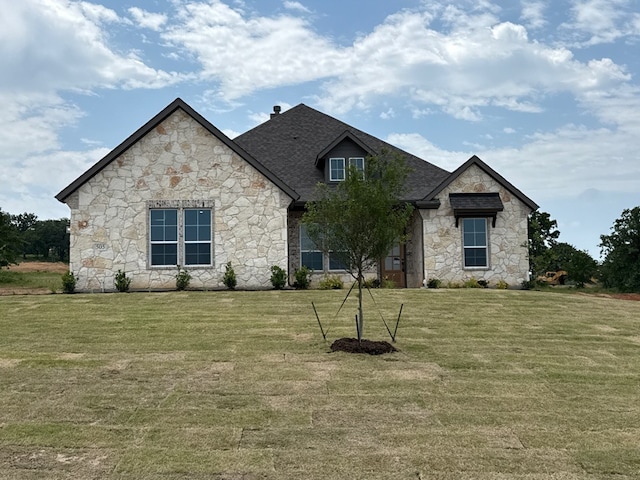 505 Ashlow Ct, Springtown, TX 76082 - french country inspired facade with stone siding, a front lawn, and a shingled roof