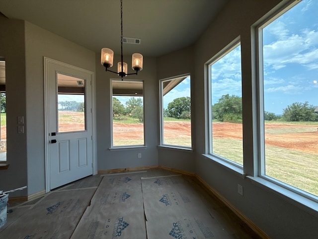 505 Ashlow Ct, Springtown, TX 76082 - unfurnished sunroom with plenty of natural light and a chandelier
