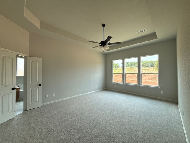 505 Ashlow Ct, Springtown, TX 76082 - unfurnished room featuring a tray ceiling, a ceiling fan, carpet, and baseboards