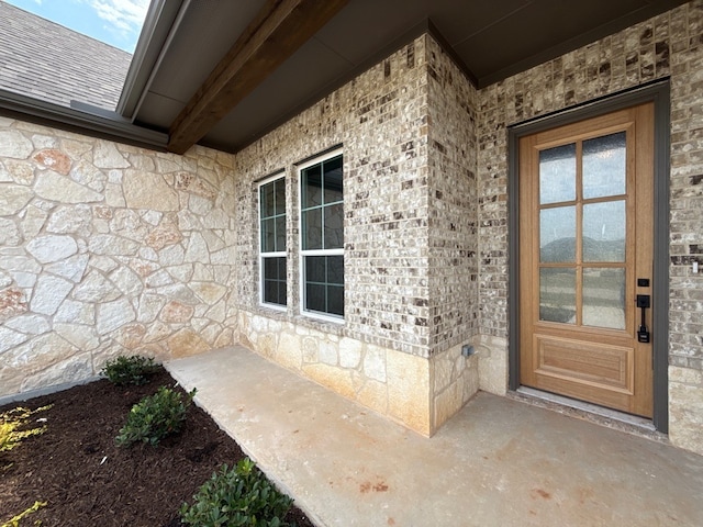 505 Ashlow Ct, Springtown, TX 76082 - property entrance featuring stone siding