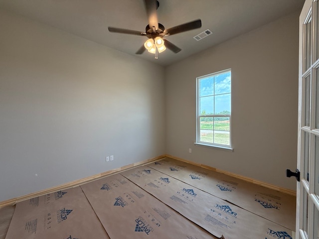 505 Ashlow Ct, Springtown, TX 76082 - unfurnished room with ceiling fan and baseboards