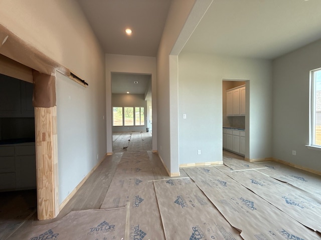 505 Ashlow Ct, Springtown, TX 76082 - hall with recessed lighting, light wood-style flooring, and baseboards