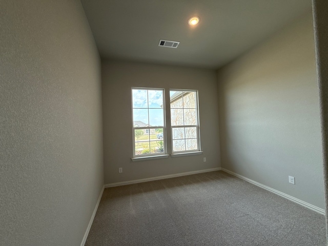 505 Ashlow Ct, Springtown, TX 76082 - carpeted empty room with baseboards