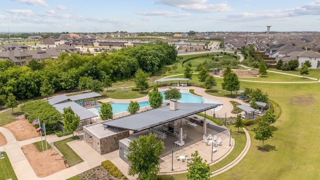 birds eye view of property with a residential view