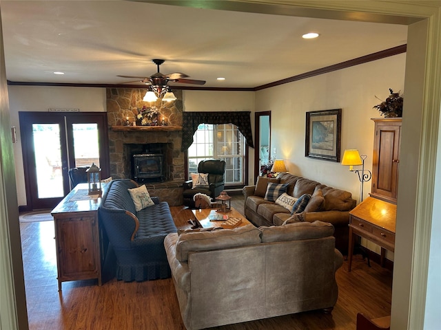 284 County Road 2388, Pickton, TX 75471 - living room with ornamental molding, a fireplace, wood finished floors, and visible vents
