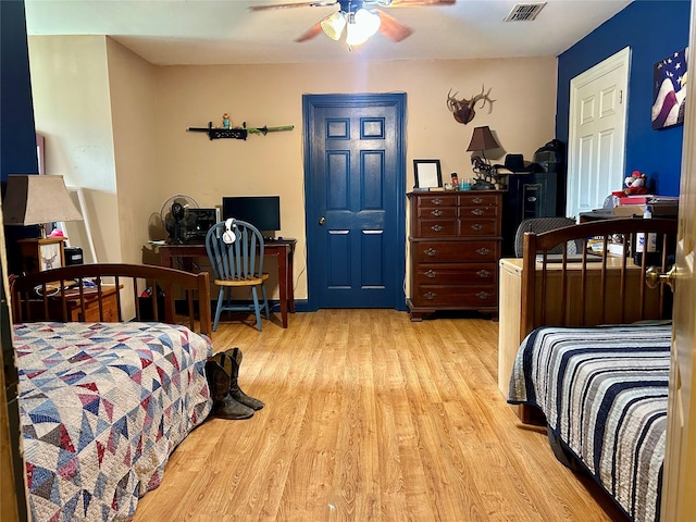 284 County Road 2388, Pickton, TX 75471 - living room featuring dark wood-style flooring, ceiling fan, visible vents, and a wealth of natural light