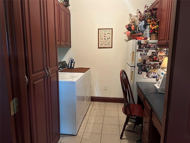 284 County Road 2388, Pickton, TX 75471 - washroom featuring cabinet space, independent washer and dryer, and light tile patterned flooring