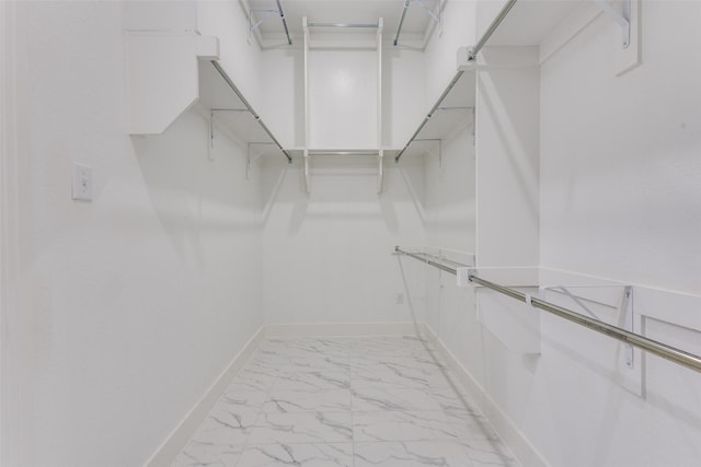4012 Prickly Pear Ave, Aubrey, TX 76227 - walk in closet featuring marble finish floor