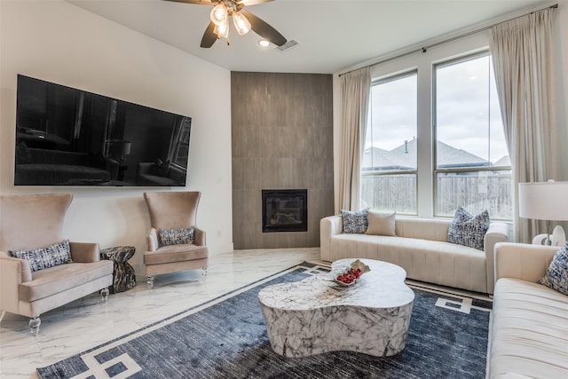 4012 Prickly Pear Ave, Aubrey, TX 76227 - living room featuring a ceiling fan, visible vents, a tiled fireplace, marble finish floor, and recessed lighting