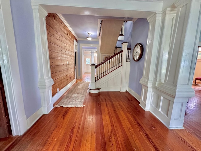900 Park Dr, Hillsboro, TX 76645 - entryway featuring crown molding, baseboards, stairs, and wood finished floors