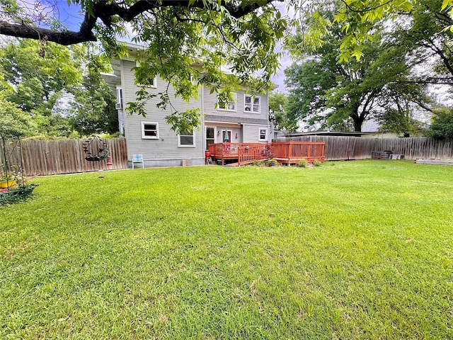 900 Park Dr, Hillsboro, TX 76645 - view of yard featuring a wooden deck and a fenced backyard