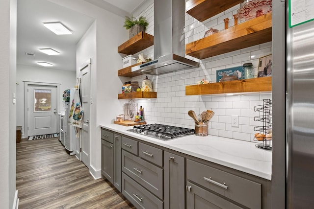 275 Ed Dutton Rd, Pottsboro, TX 75076 - kitchen with open shelves, gray cabinets, appliances with stainless steel finishes, island range hood, and dark wood-style flooring