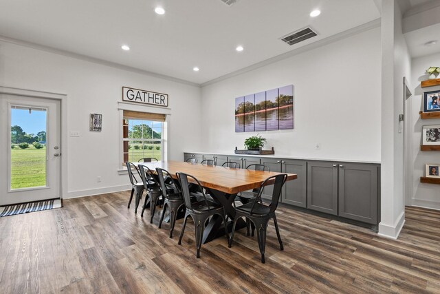 275 Ed Dutton Rd, Pottsboro, TX 75076 - dining space featuring dark wood finished floors, recessed lighting, crown molding, and baseboards