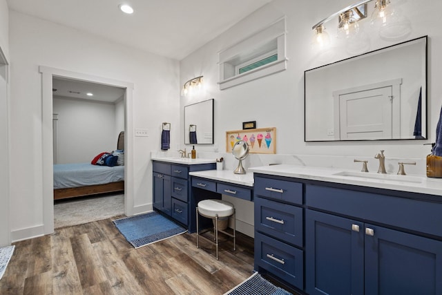 275 Ed Dutton Rd, Pottsboro, TX 75076 - bathroom with wood finished floors, ensuite bath, vanity, and recessed lighting