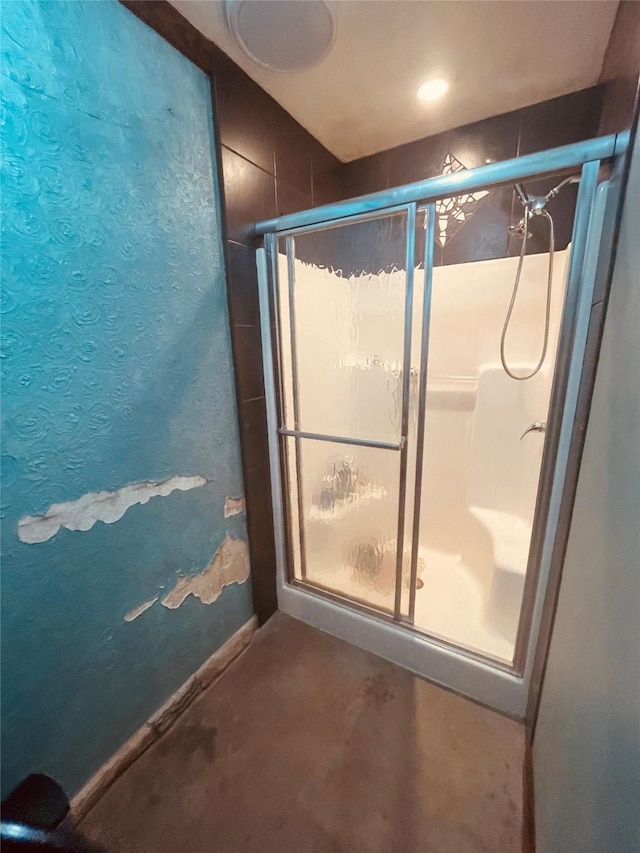 bathroom with a shower stall
