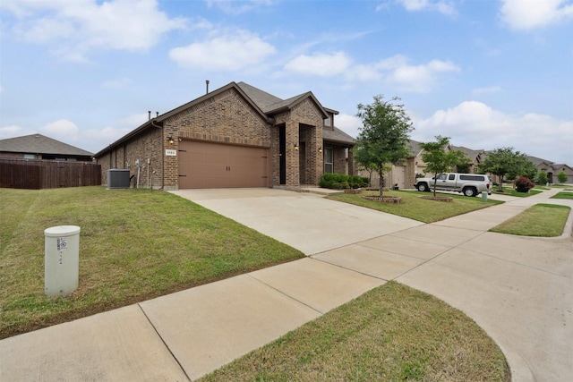 view of front of home with brick siding, an attached garage, fence, and driveway