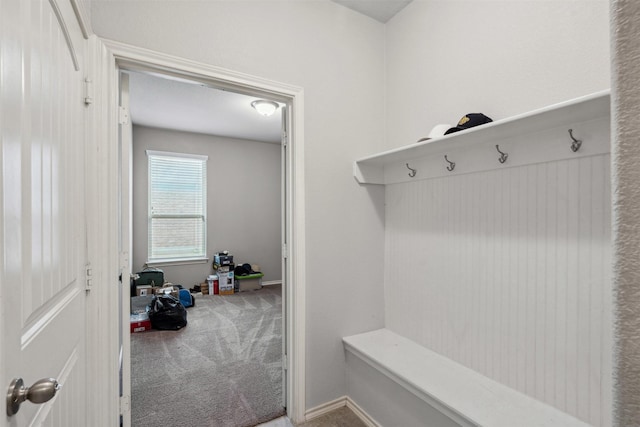 mudroom with carpet floors