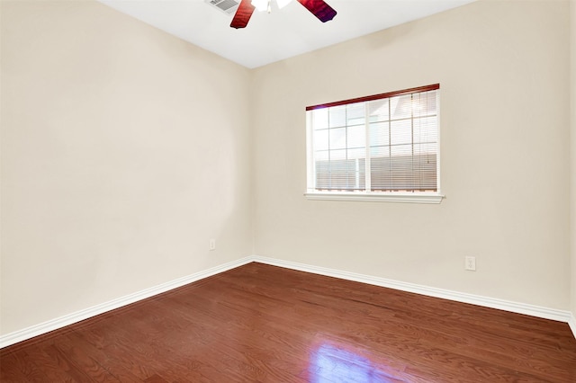 3837 Evesham Dr, Plano, TX 75025 - unfurnished room with dark wood finished floors, baseboards, and ceiling fan
