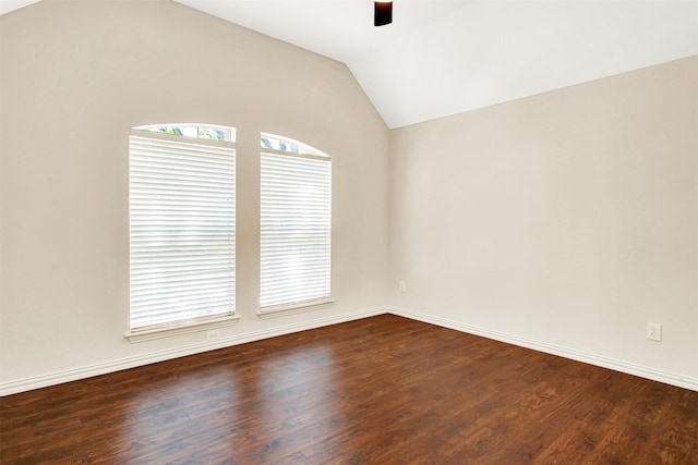 3837 Evesham Dr, Plano, TX 75025 - empty room with a ceiling fan, dark wood-type flooring, vaulted ceiling, and baseboards