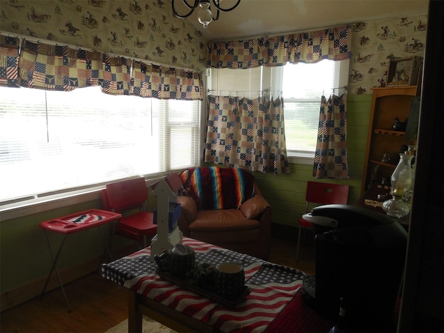 126 County Road 541, Eastland, TX 76448 - living area featuring wood finished floors and wallpapered walls