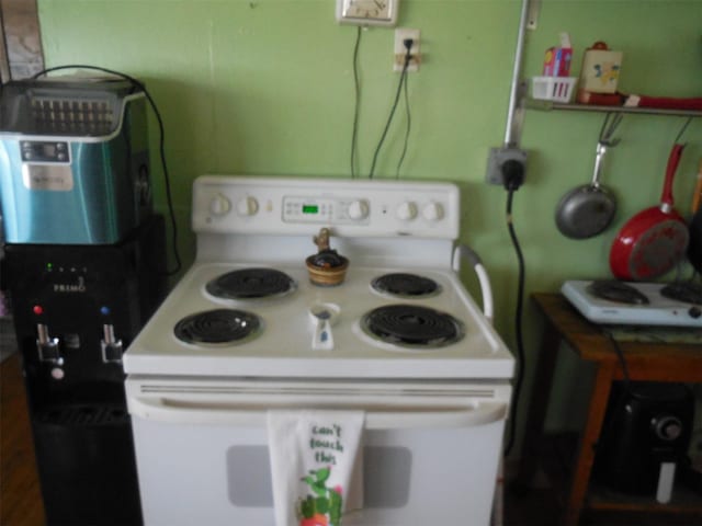 126 County Road 541, Eastland, TX 76448 - kitchen with white range with electric stovetop