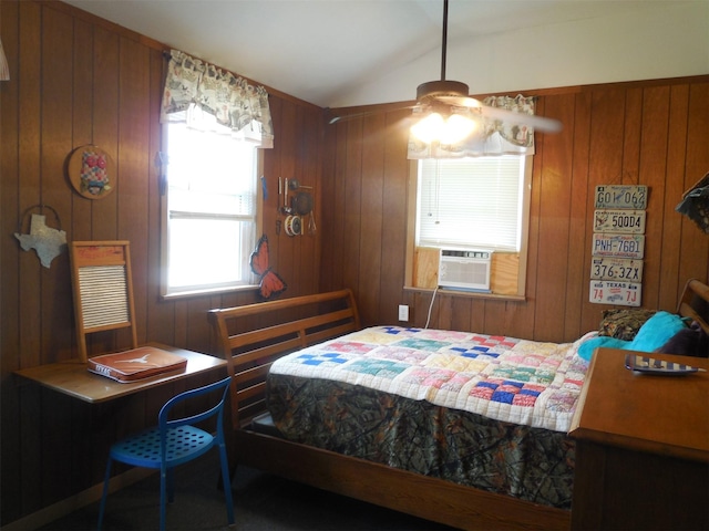 126 County Road 541, Eastland, TX 76448 - bedroom with wooden walls, cooling unit, and lofted ceiling