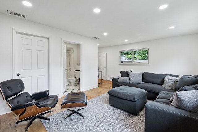 9918 Rustleleaf Dr, Dallas, TX 75238 - living room featuring recessed lighting, light wood finished floors, and baseboards